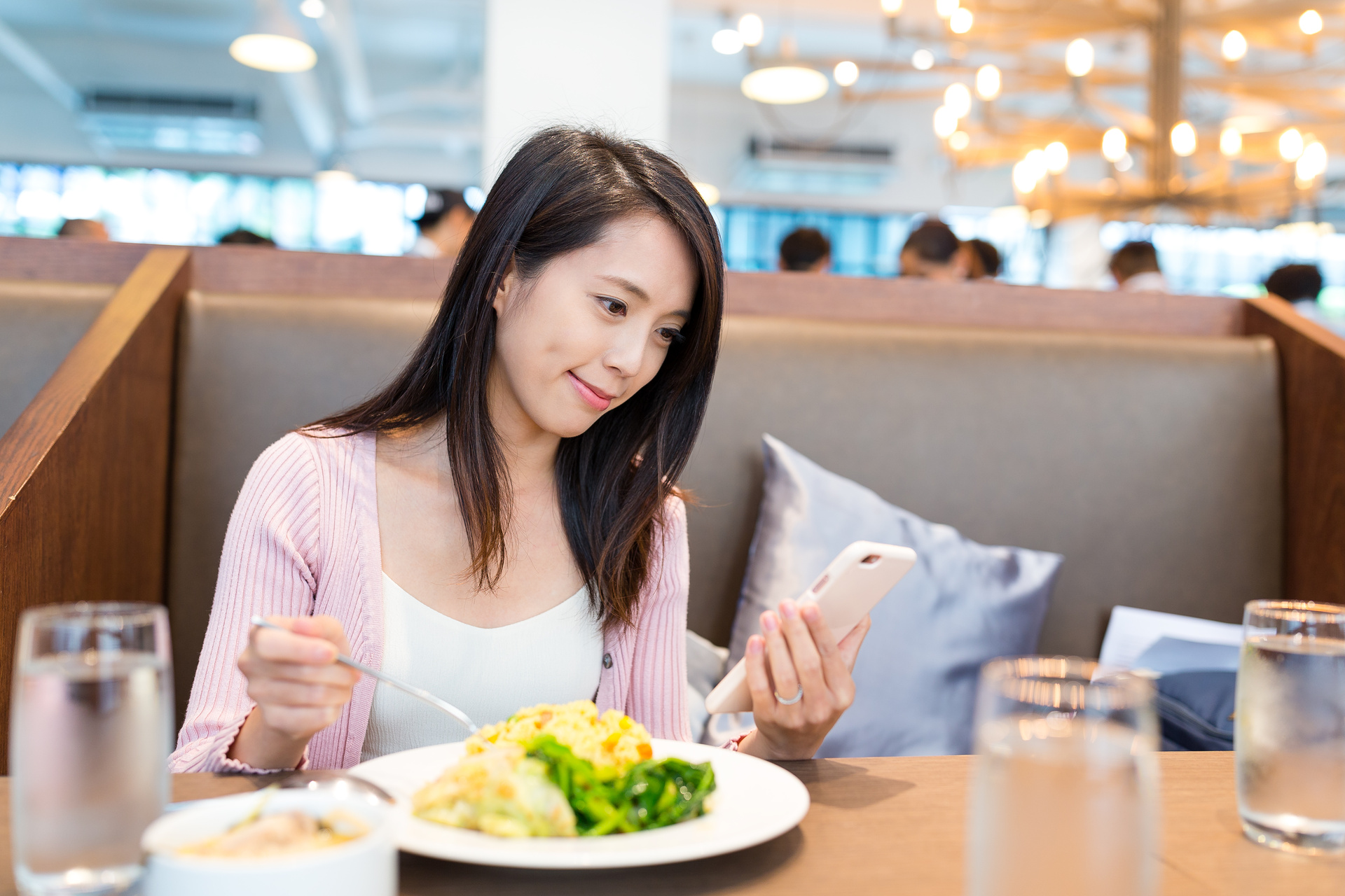 Woman Having Lunch in Restaurant