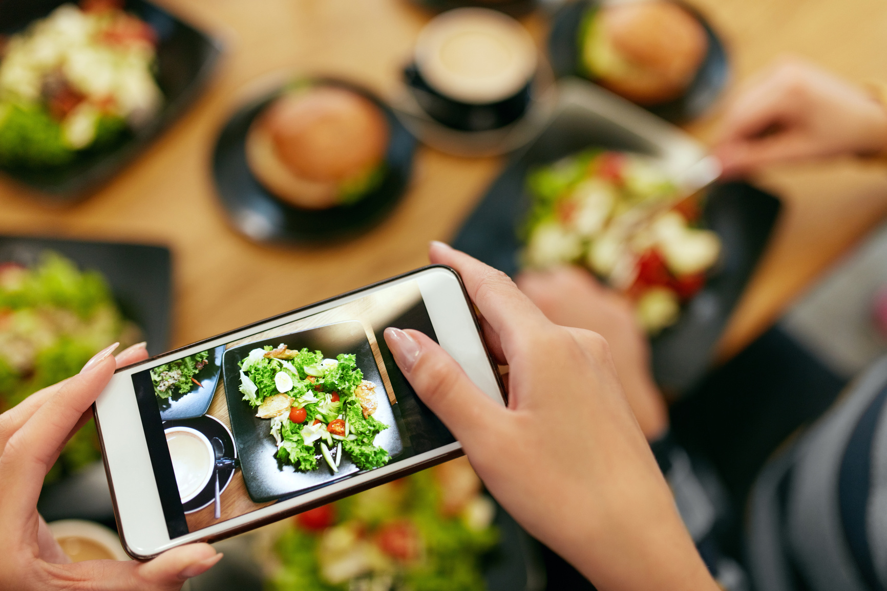Food Photography On Smart Phone In Restaurant